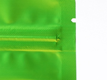 Close-up of a printed stand-up pouch showing a tear notch for easy opening