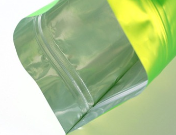 Close-up of a printed stand-up pouch showing a press-to-close zipper track