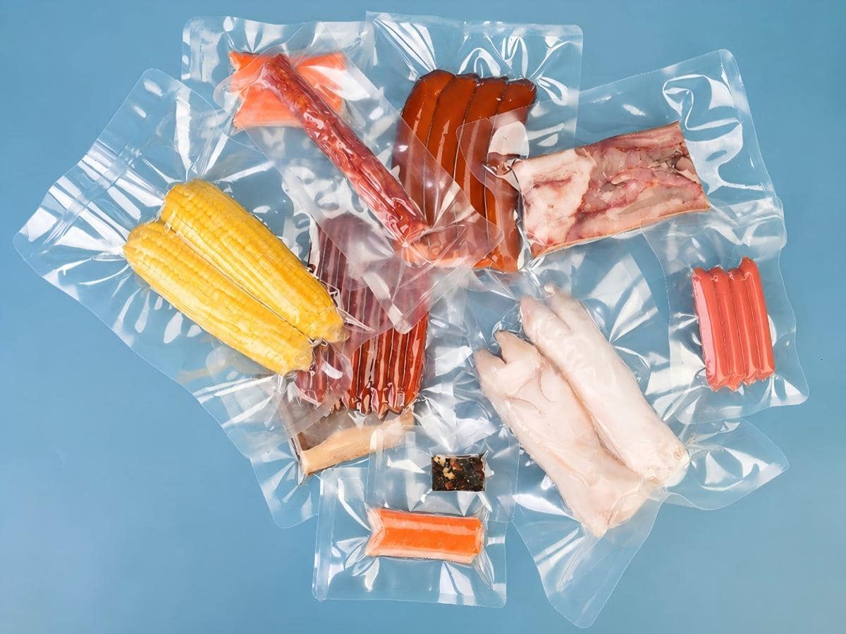 Clear vacuum bags for frozen food packaging with vegetables, seafood and prepared food samples