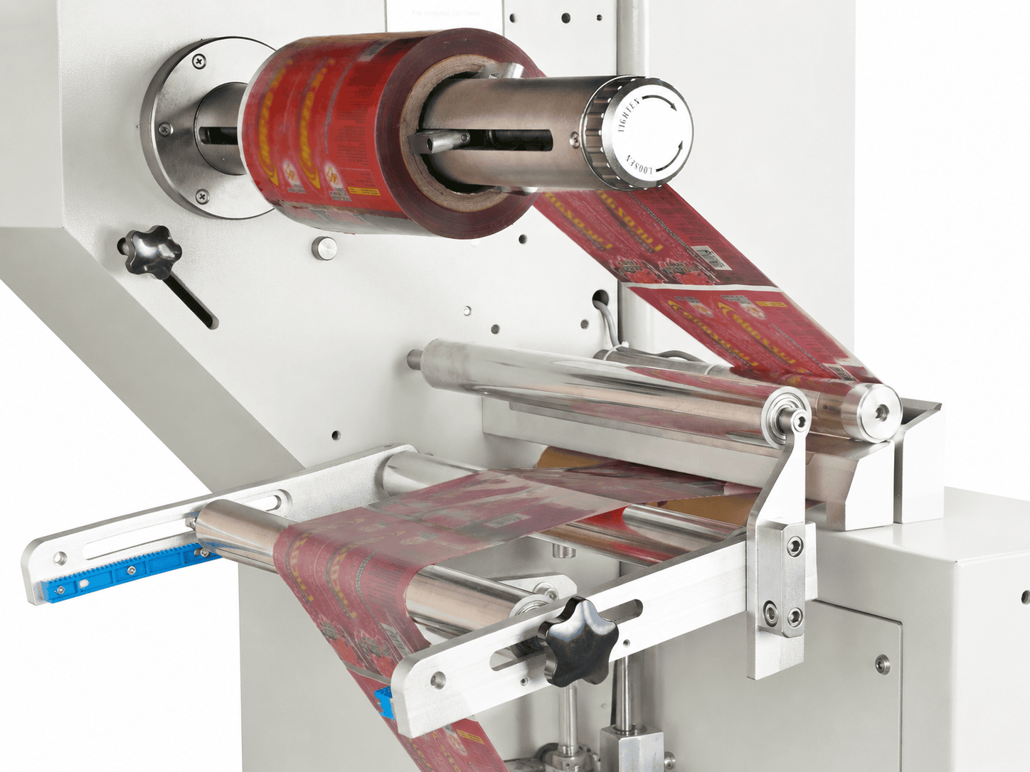 Rollstock film packaging roll for automated packing machine