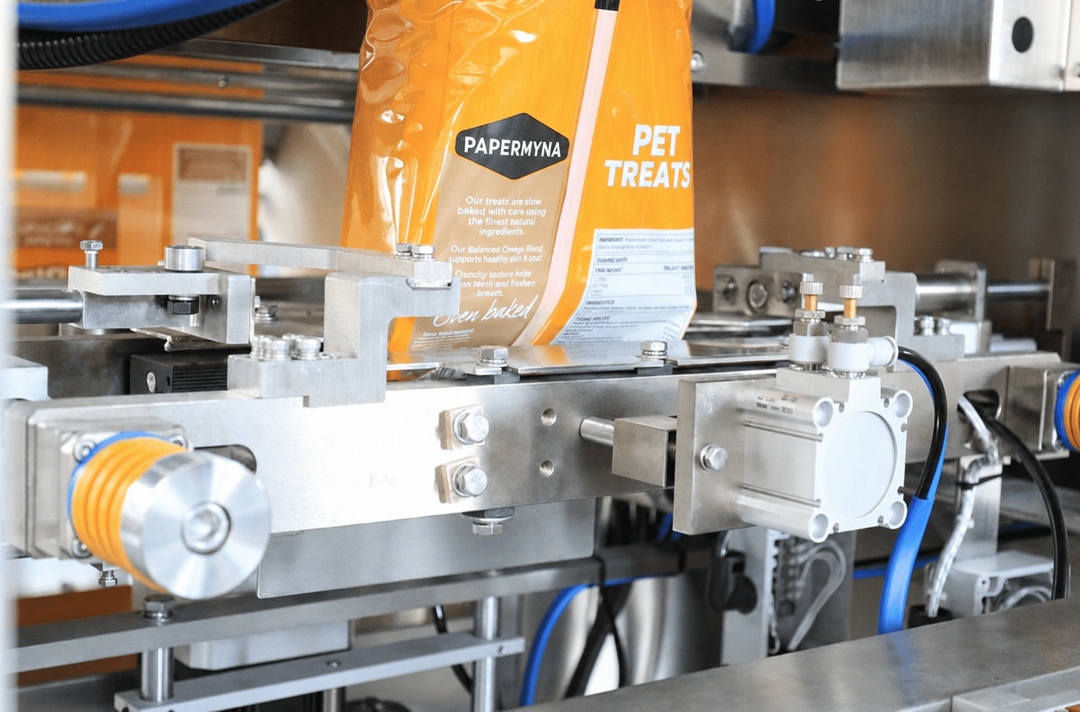 Flexible packaging pouches moving through a form fill seal production line